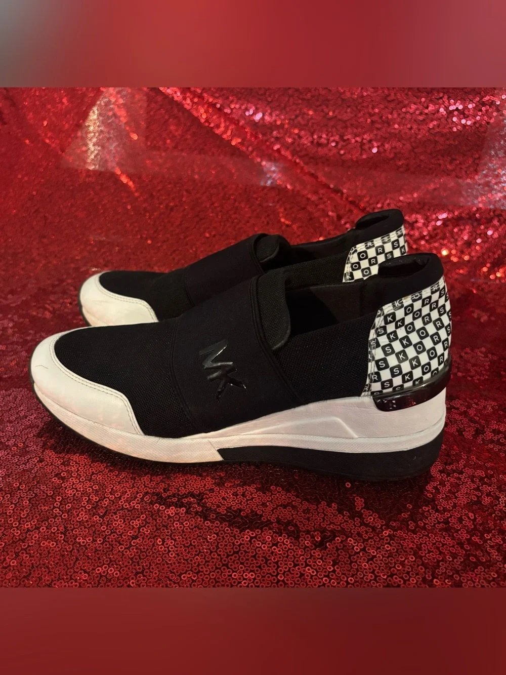 Michael Kors Black and White Slip-On Sneakers with Logo Heel Accent